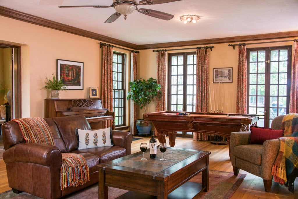 Our cozy living room in the best Brattleboro, VT lodging is the perfect place to unwind with a glass of wine.