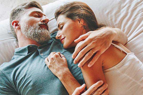 Couple Sleeping in a bed