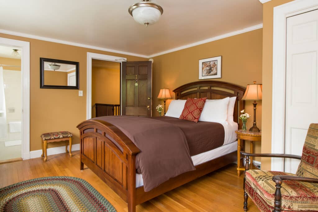 The deluxe queen bed in the Mountain View Room at Inn on utney Road, the best Vermont Bed and Breakfast.