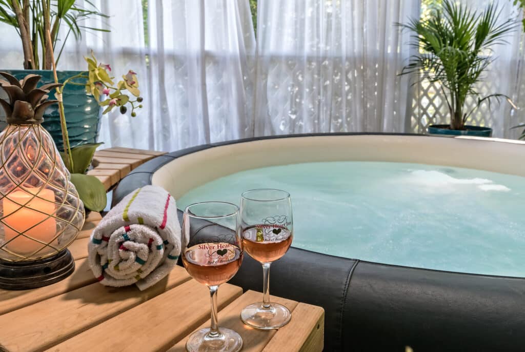 The private outdoor spa is the perfect place to relax and enjoy a glass of wine after exploring Independence on your Missouri getaways.
