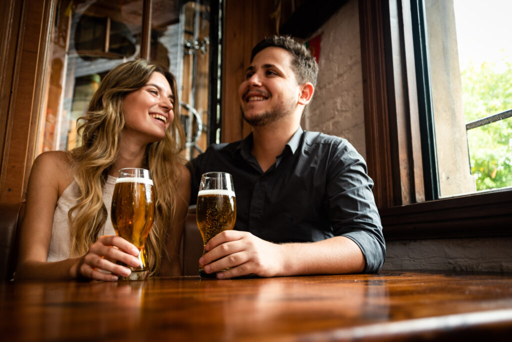 Young man and woman enjoy beer at unique Baraboo brewery- Al. Ringling Brewery.