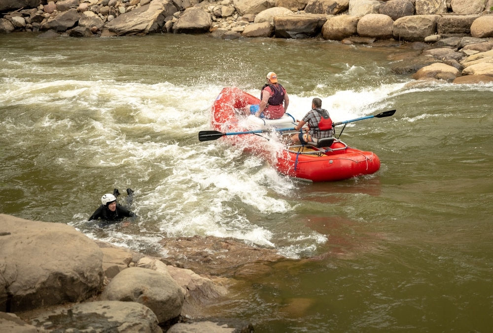 People whitewater rafting in Durango