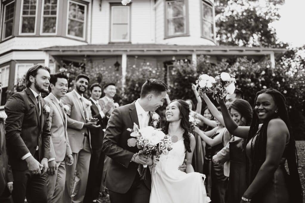 The happy couple leaving their dream wedding at South Mountain Inn, one of the best affordable wedding venues in PA.