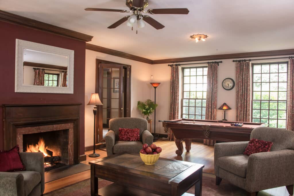 Unwind by the fire in the living room of Inn on Putney Road after you've explored the hiking trails in Brattleboro.