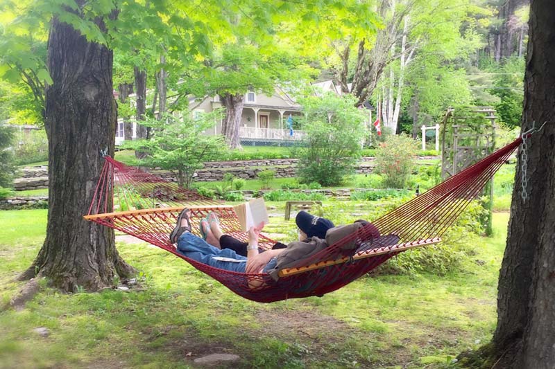 Man reading in a hammock