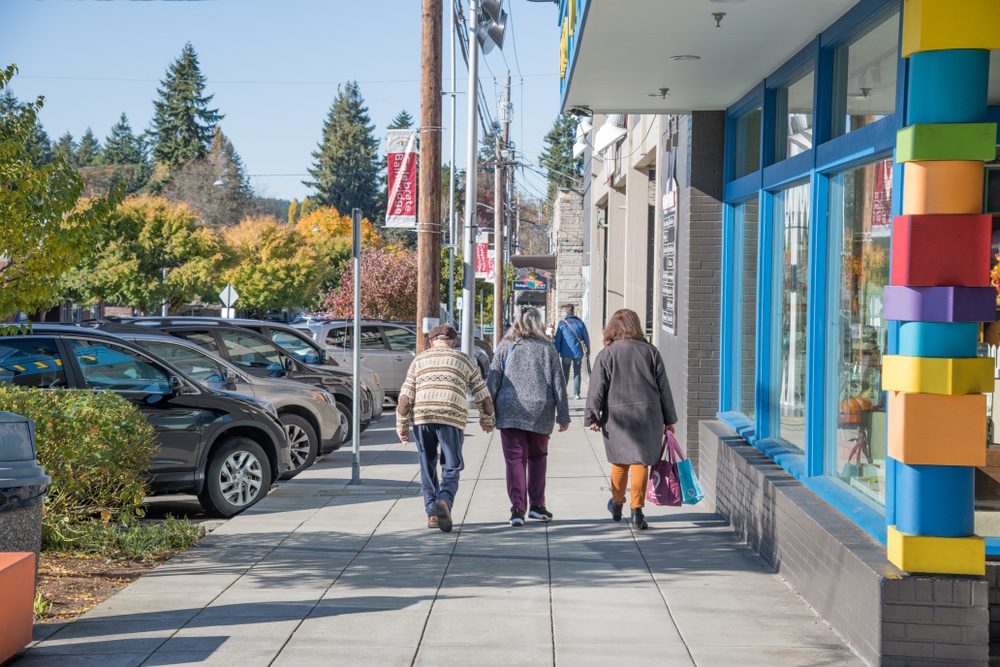Visitors and locals alike wander Winslow Way in downtown Bainbridge Island for shopping and dining.