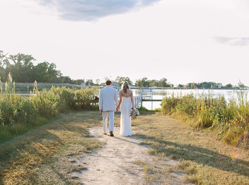 Couple on the beach at our wedding venue in Maryland
