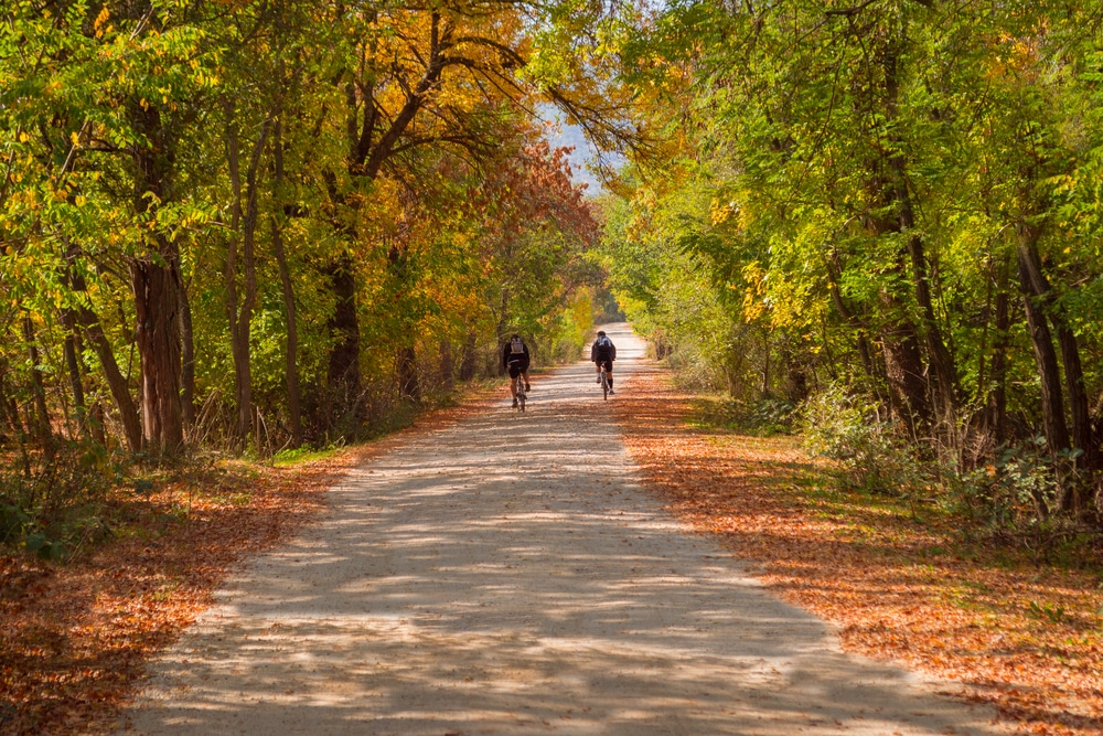 One of the most unique hotels near Sharon for your romantic getaways this year. Two cyclists on a fall trail