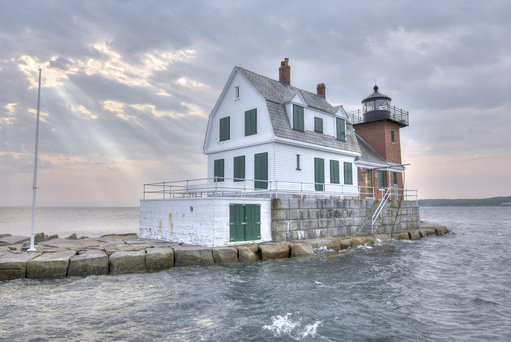 Visit the Rockland Breakwater Lighthouse during one of the best weekend getaways in Maine. Image of the Rockland Breakwater Lighthouse.