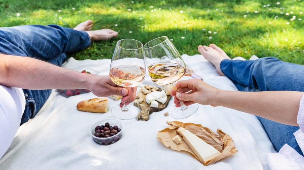 Couple Picnics on their Florida Weekend Getaways For Couples in Washington Oaks Gardens State Park