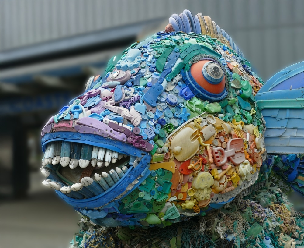 Colorful fish sculpture crafted from recycled plastic waste at Washed Ashore Gallery, one of the best things to do in Bandon on a rainy day.
