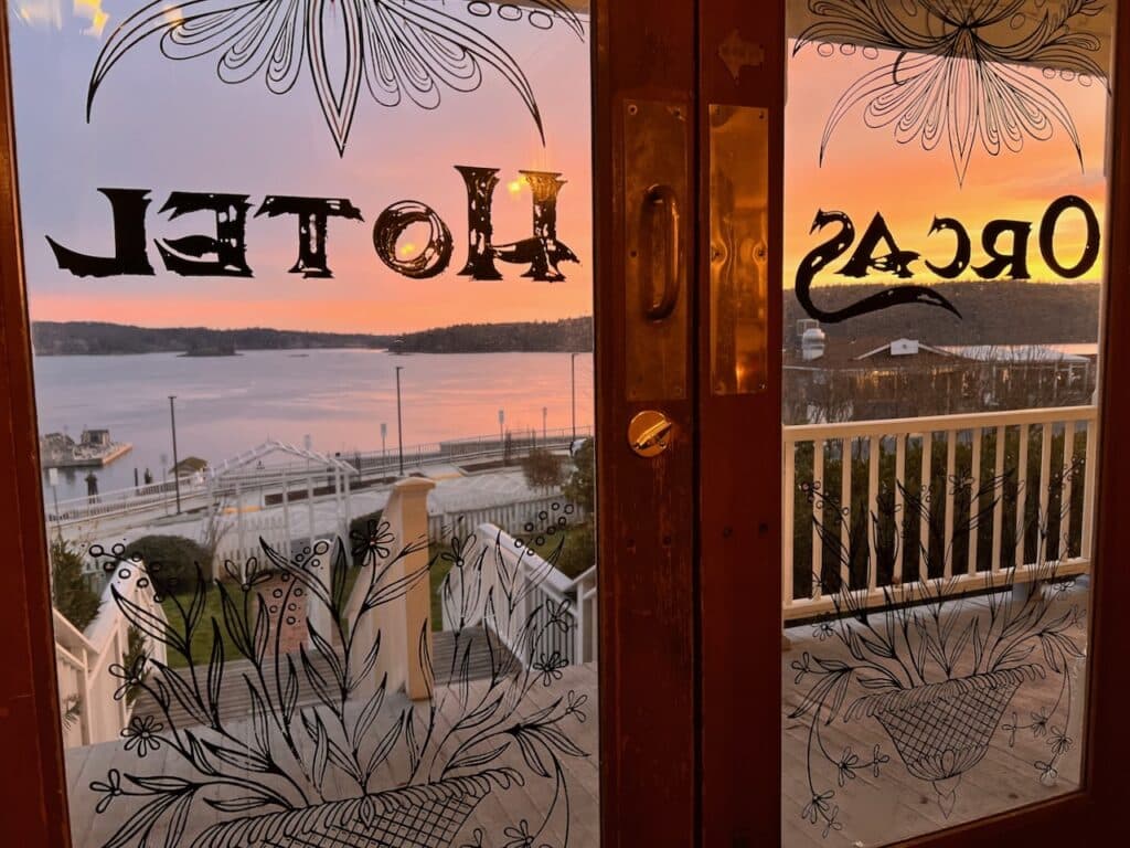 Sunset through the front door of our historic Orcas Island Hotel