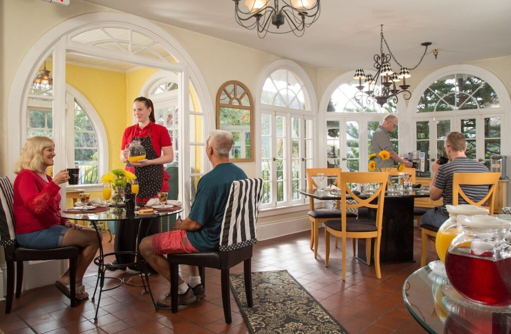 Bed and Breakfast in St. Augustine, photo of guests at our B&B enjoying breakfast in our dining room