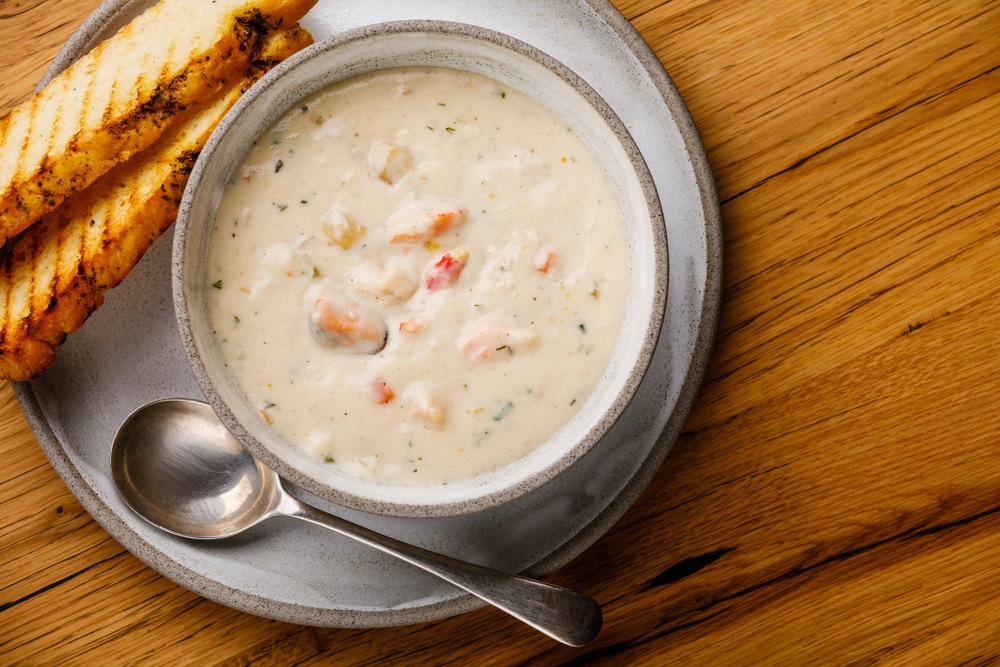 warm up with a bowl of clam chowder in winter at coastal Places to Visit in Oregon 