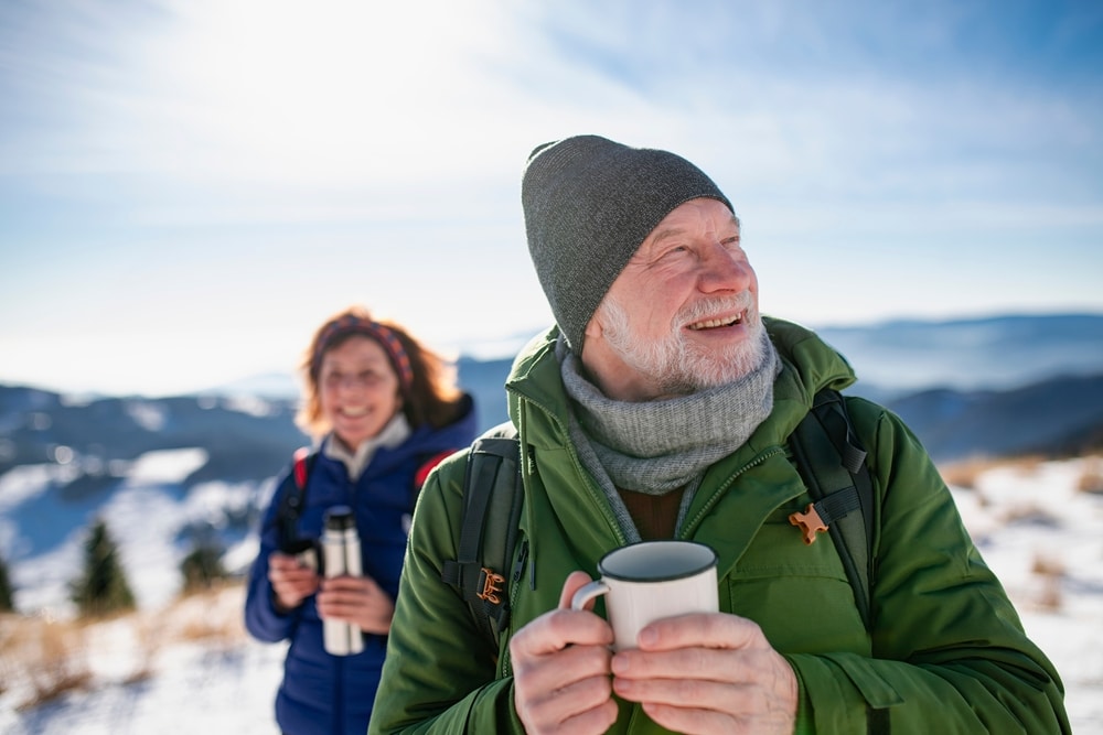 Senior couple enjoying winter hikes near Asheville in the Western North Carolina mountains