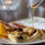 Maple syrup on blueberry cobbler for breakfast