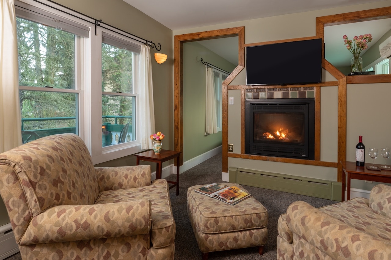 One of our guest rooms with a fireplace at our hotel on the lake, the perfect retreat after dinner at one of the best Deep Creek Lake restaurants 