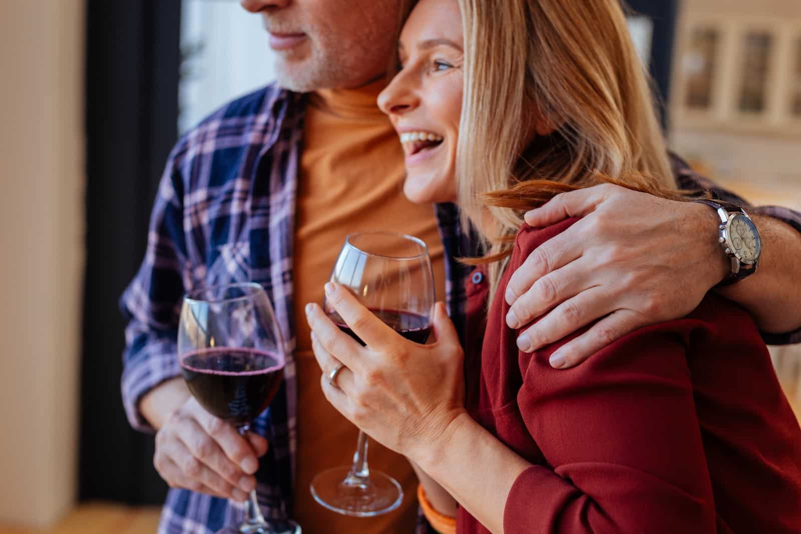 Couple enjoying wine together while enjoying one of the most romantic getaways in Nebraska