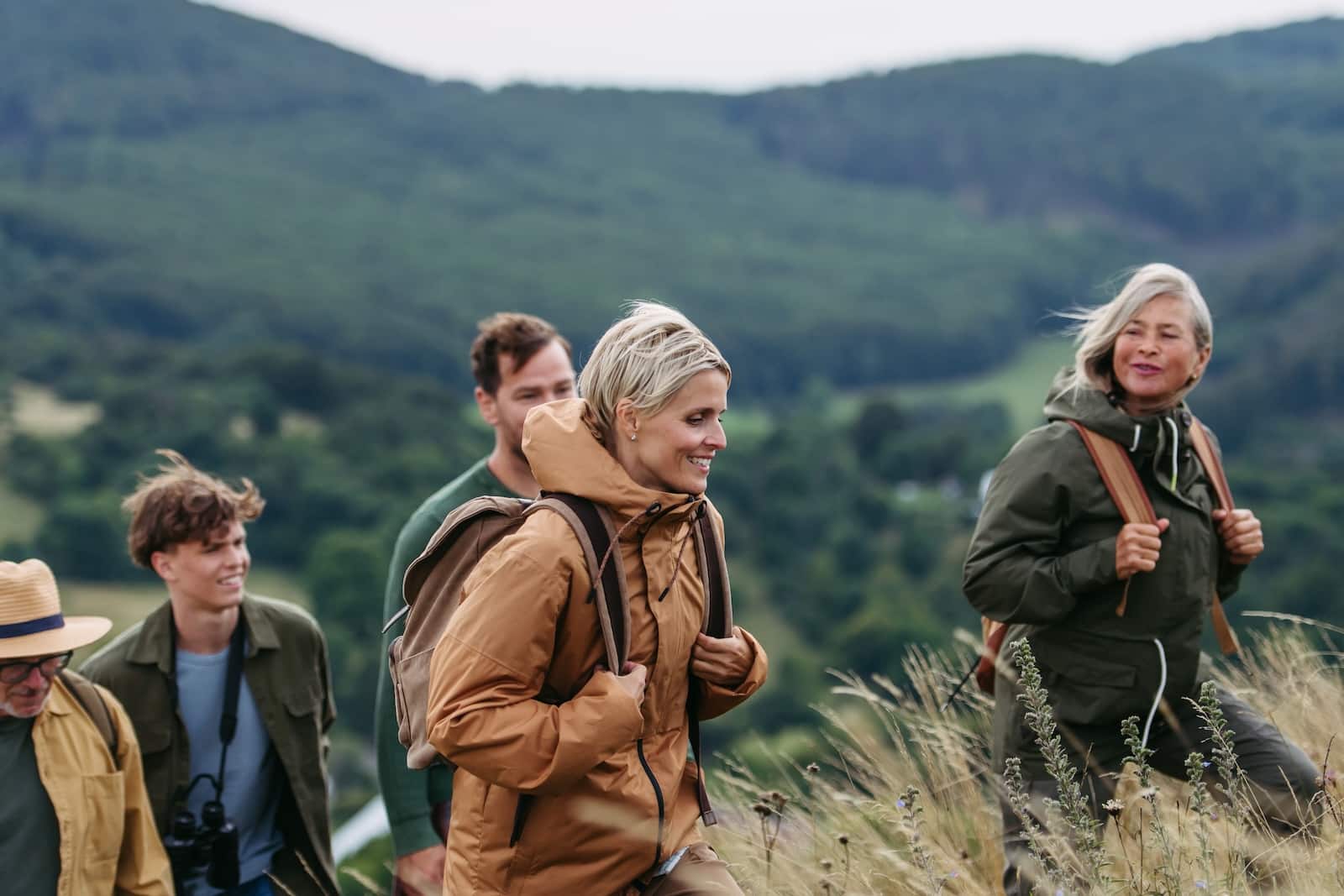 Multigenerational family on hiking trip in Vermont, near one of the best Vermont wedding venues