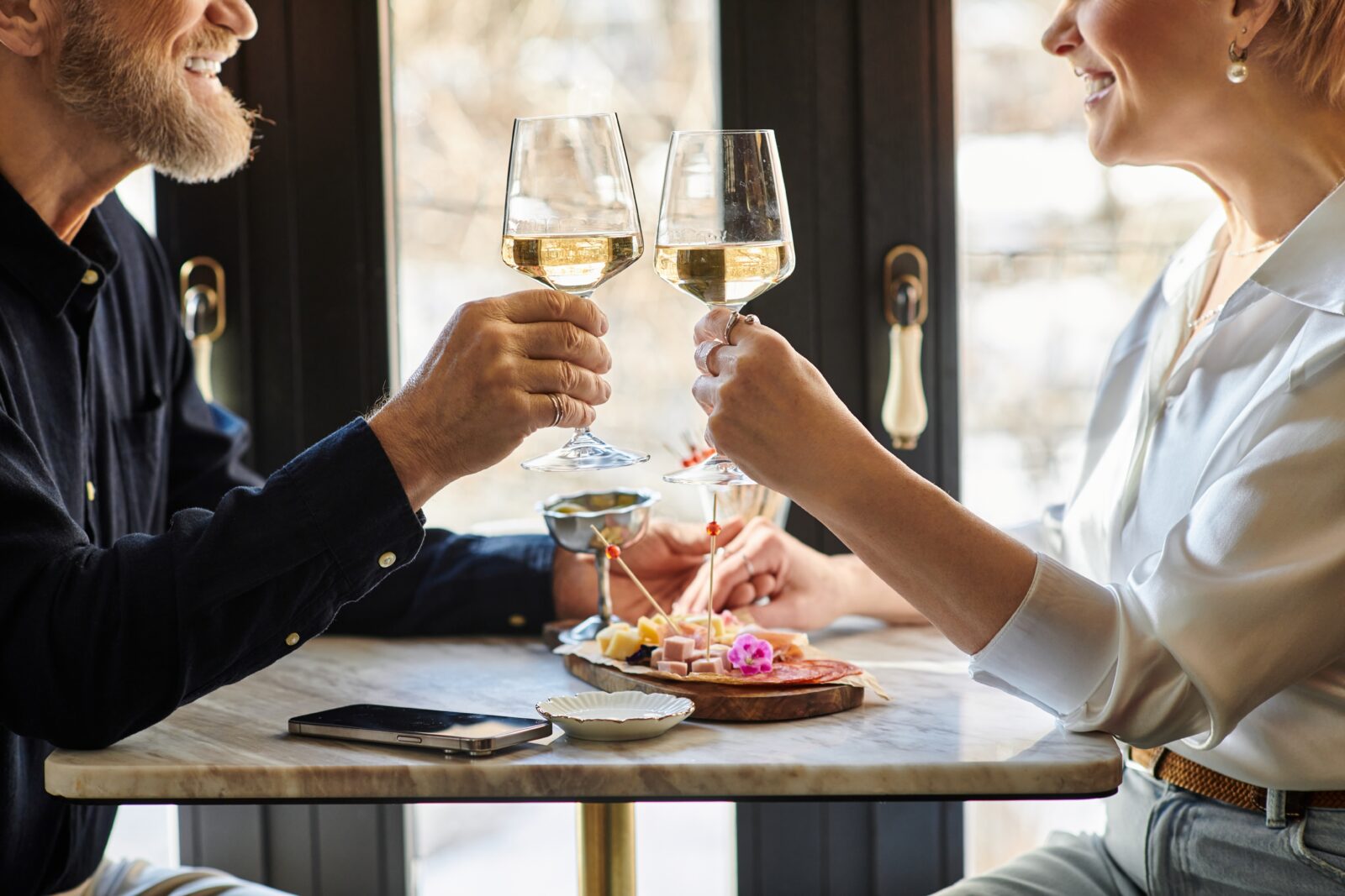 couple enjoying tapas and wine at Hitchcock Bainbridge.