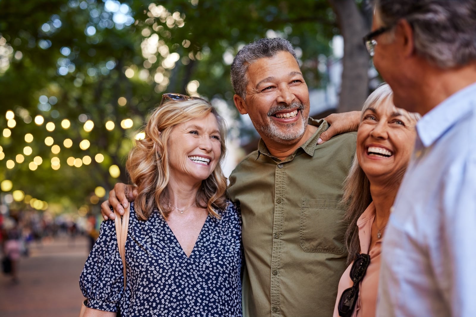 Group of happy senior friends as they explore Dubuque, one of the best places for weekend getaways in Iowa