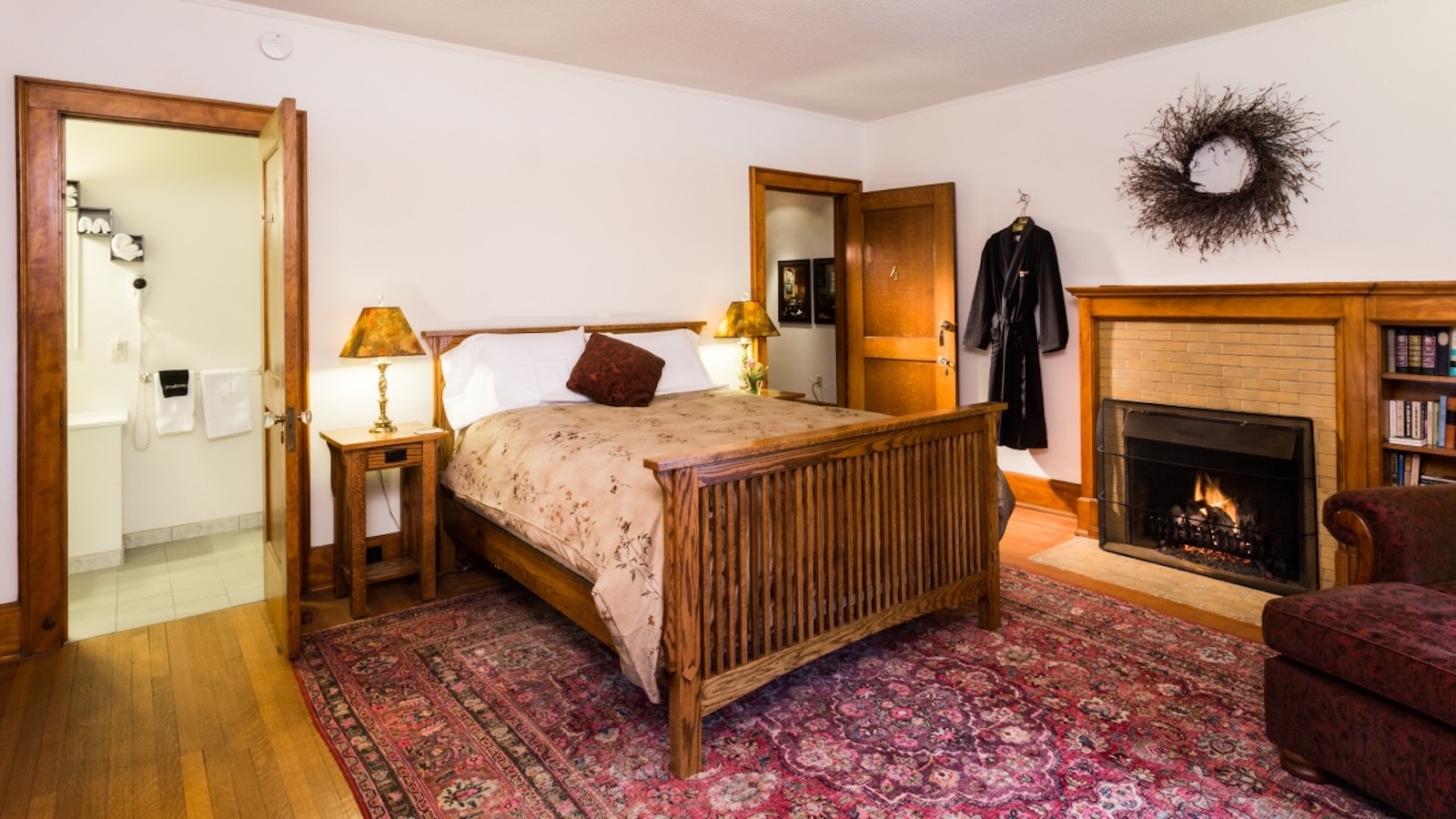 After you're done will all of the romantic things to do in Wausau, enjoy a stay at the luxurious Stewart Inn Boutique Hotel. This guest room features a queen size bed and a fireplace. 