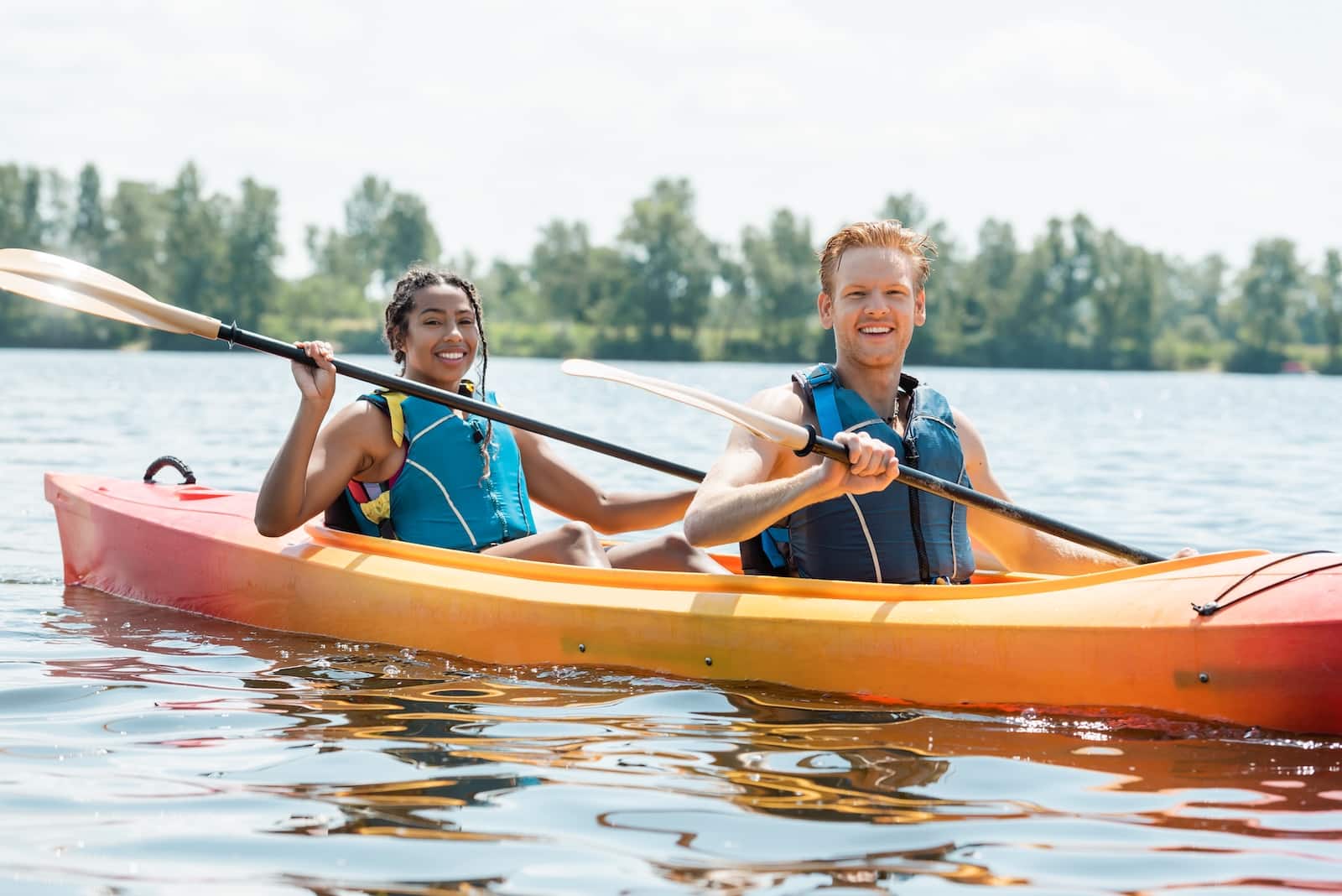 Couple kayaking in Peninsula State Park in Door County, Wisconsin