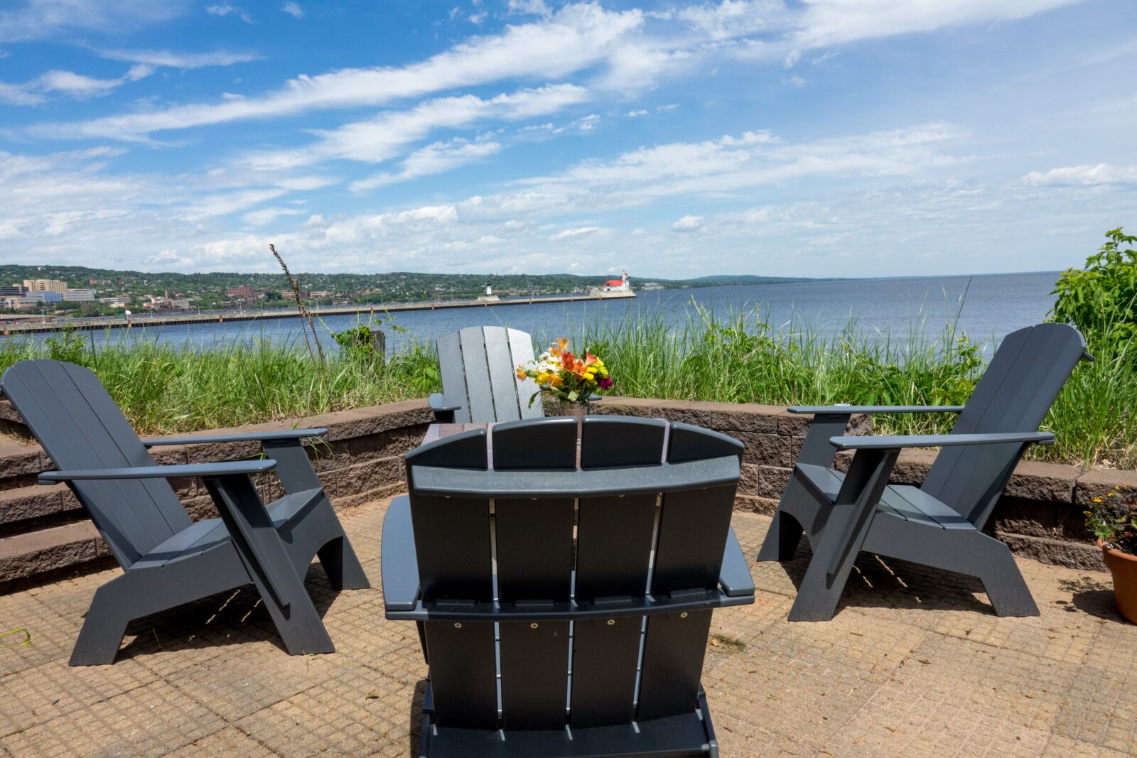 Enjoy our beautiful grounds, right on Lake Superior. Seating area in the garden.