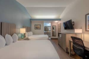 two bedroom room with desk area at our Bandon Hotel