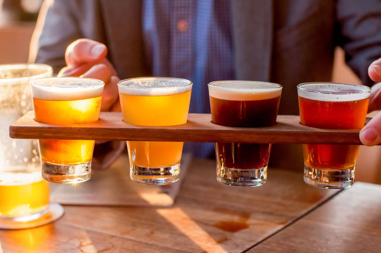 A selection of four craft beers on a table at one of the Wausau breweries in Wisconsin.