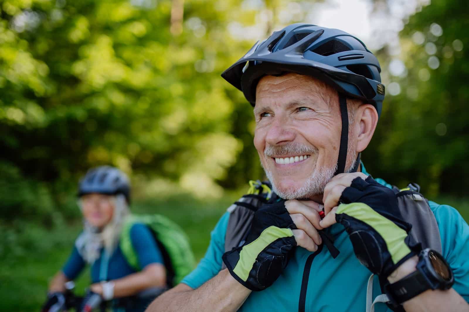 Senior couple who are avid cyclists exploring the Rail Trails in the Midwest