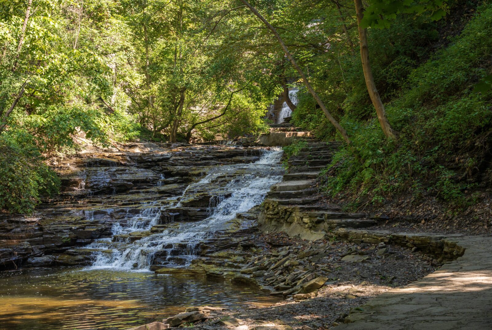 The stone staircases and one of the waterfalls on the Cascadilla Gorge Trail.
