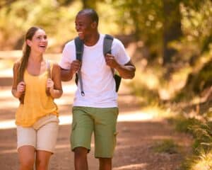 A young couple walking together in the Petrified Forest in Mississippi
