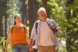 couple hiking the swallow falls canyon trail on beautiful summer day