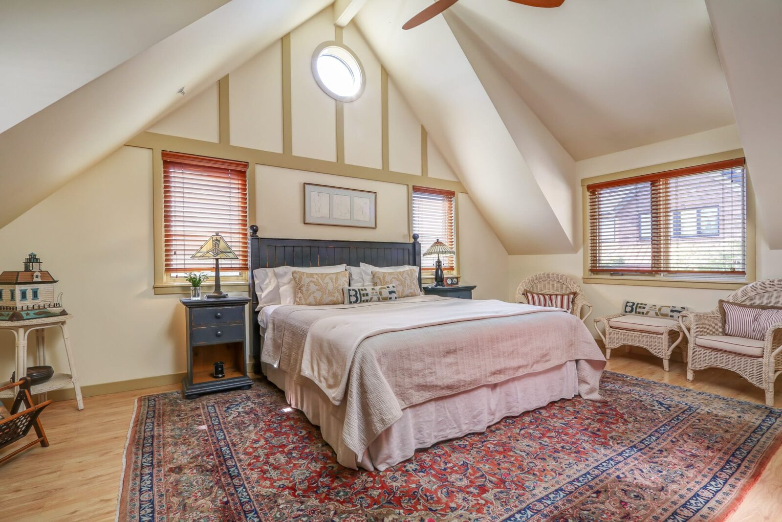 Bedroom with vaulted ceilings at our downtown Winslow Bainbridge Island Hotel