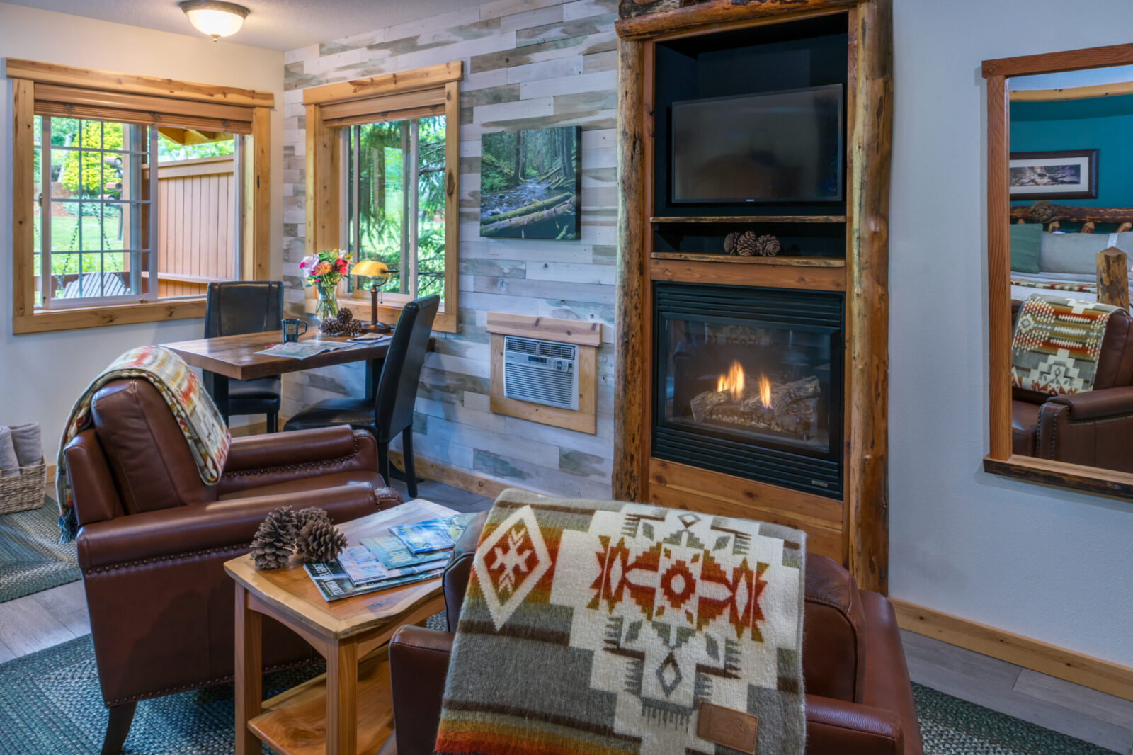 The Green Leaf Cabin seating area with fire place