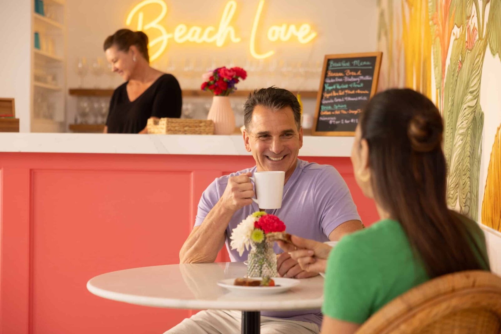 Couple having a continental breakfast at our Flagler Beach Florida Hotel.