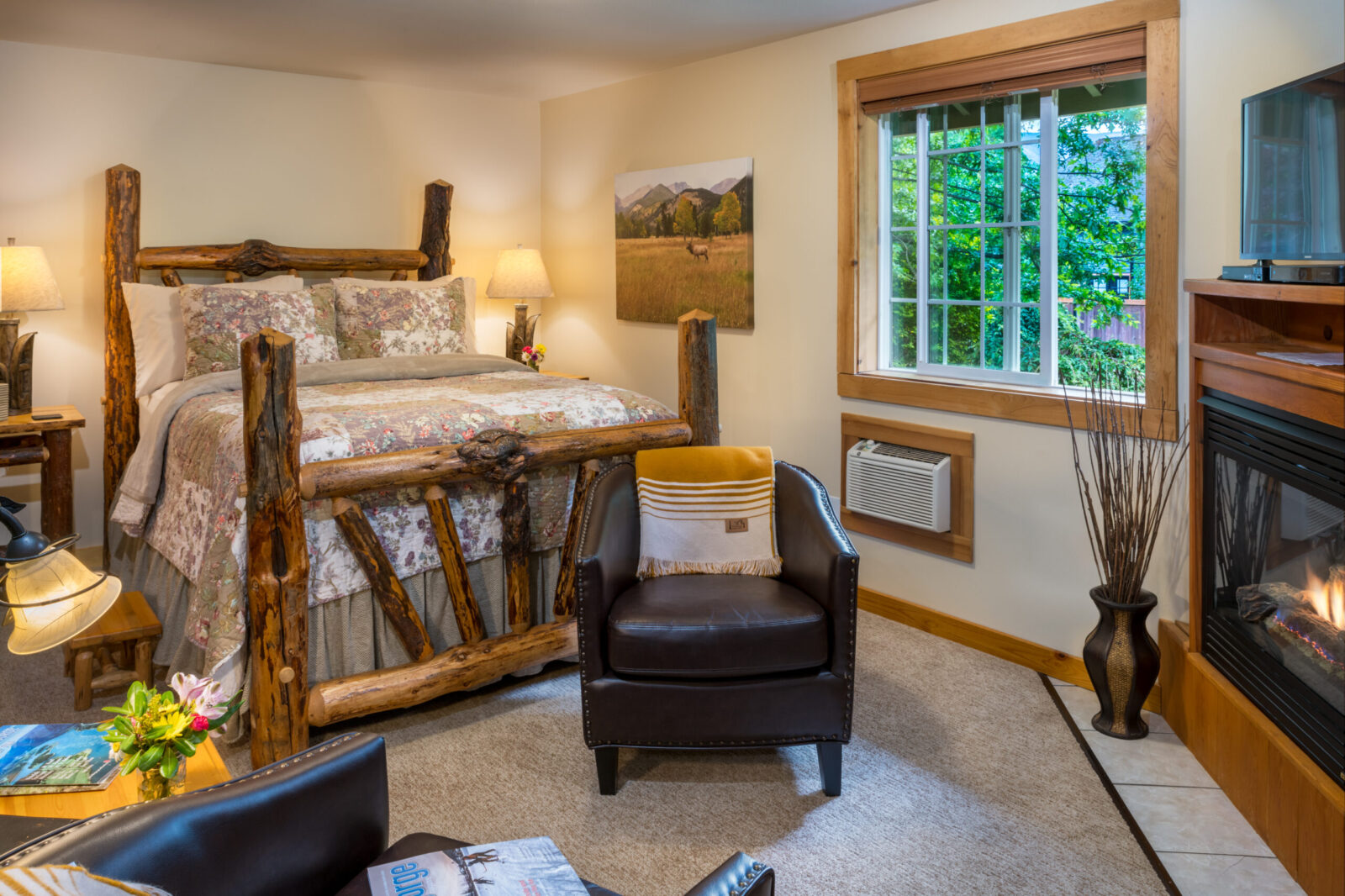 The Knotty Pine Cabin at Carson Ridge features hand crafted furniture and fireplace.