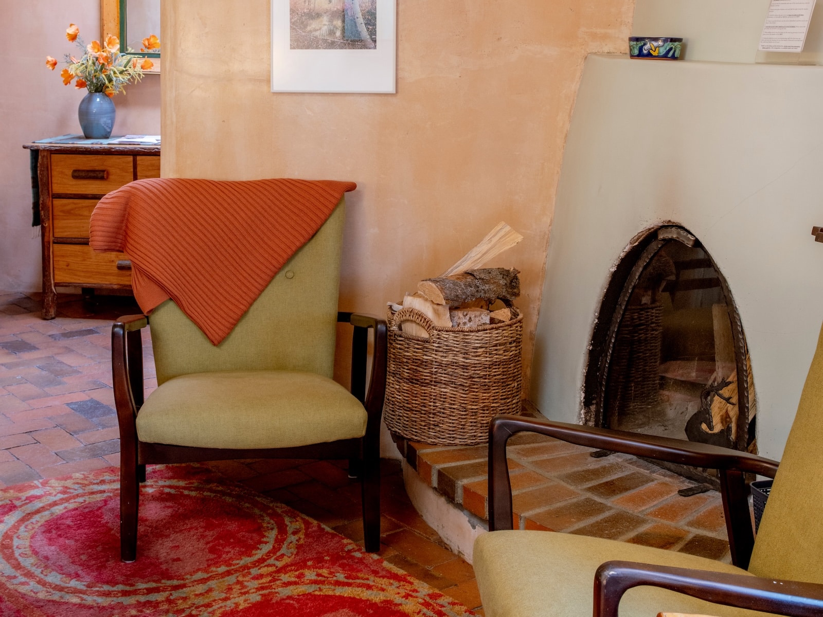 A fire place beside a seating area at a Santa Fe New Mexico Bed and Breakfast.
