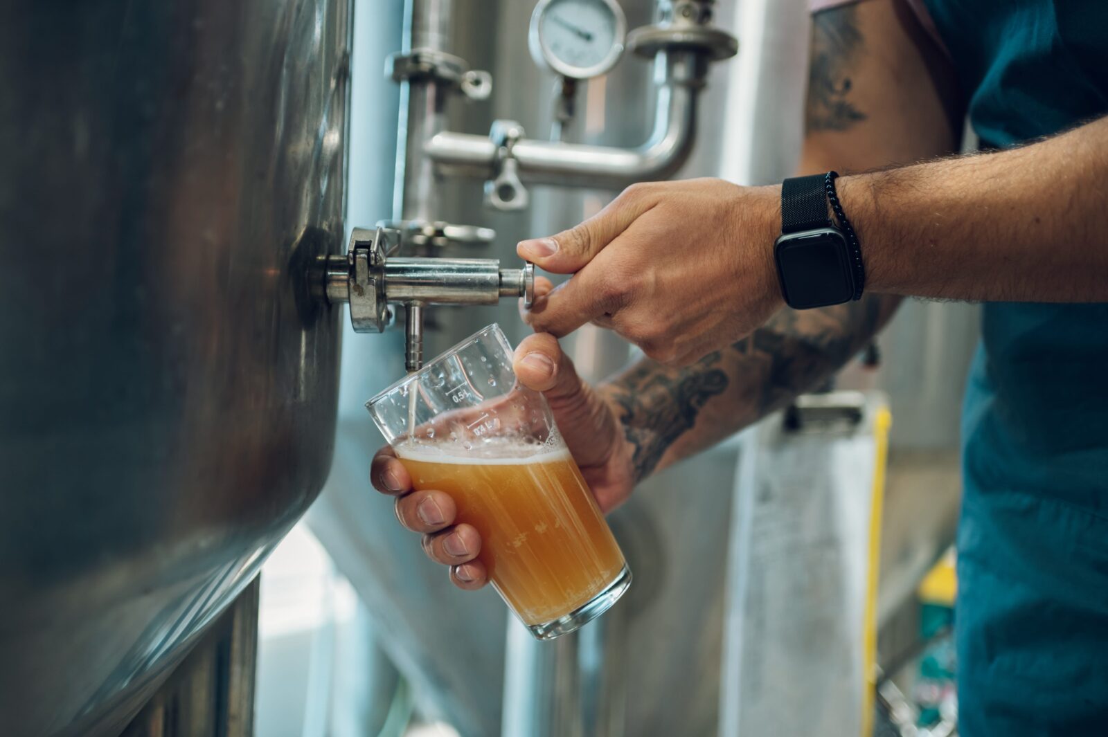Brewer examining the quality of beer at Bent Paddle Brewing in Duluth