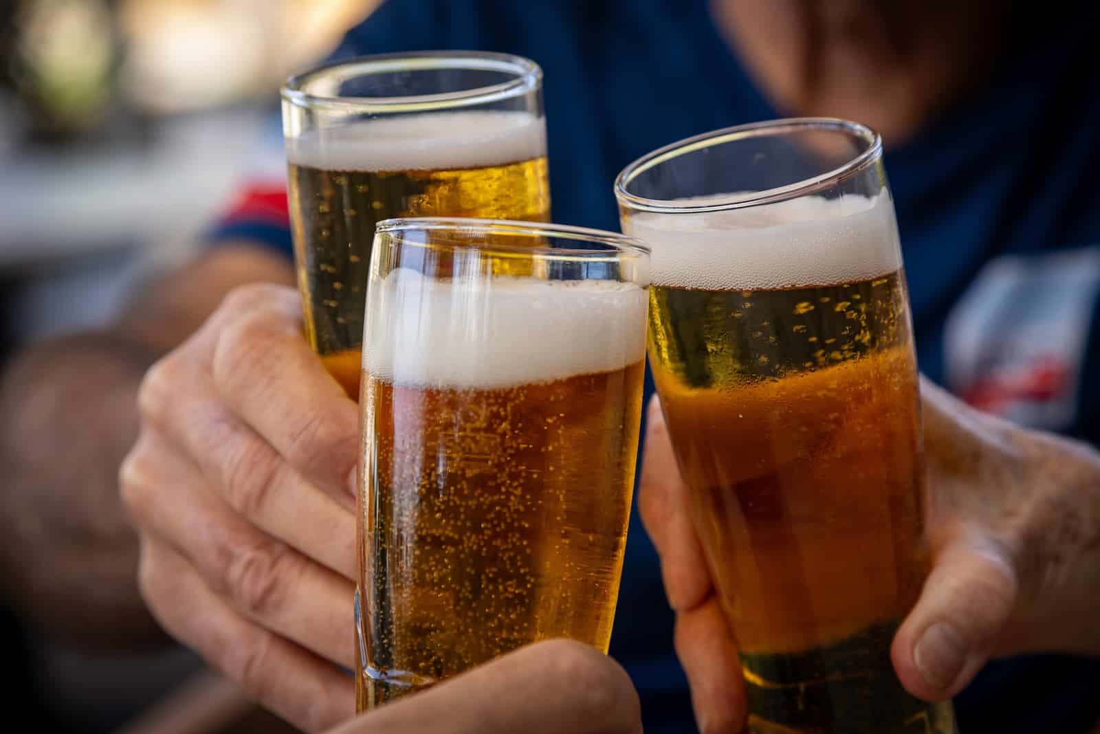 Three glass of beer enjoyed by friends on the Charlottesville Ale Trail.