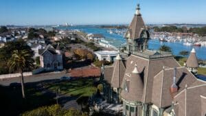 View of historic Victorian era waterfront district in the morning light. Still water in Humboldt Bay, take a Madaket Harbor Cruise in Eureka
