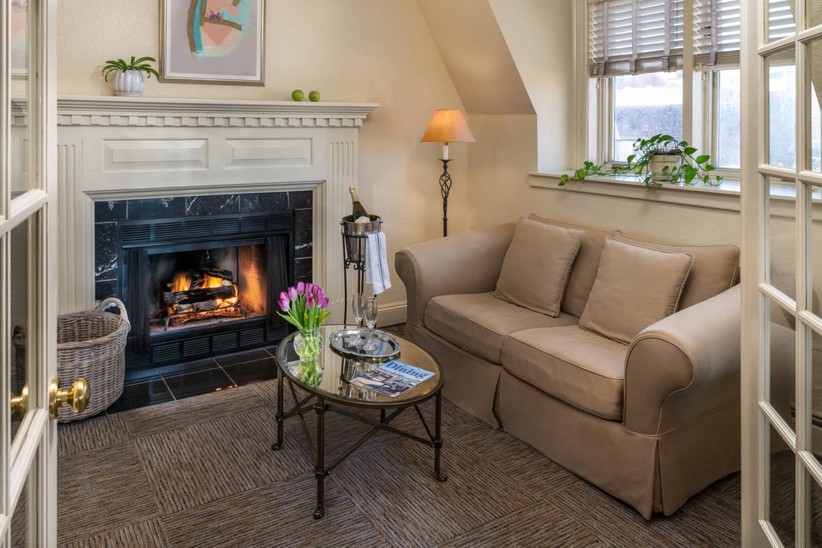 Suite with fireplace and seating area at our Hotel near the Trees of Mystery