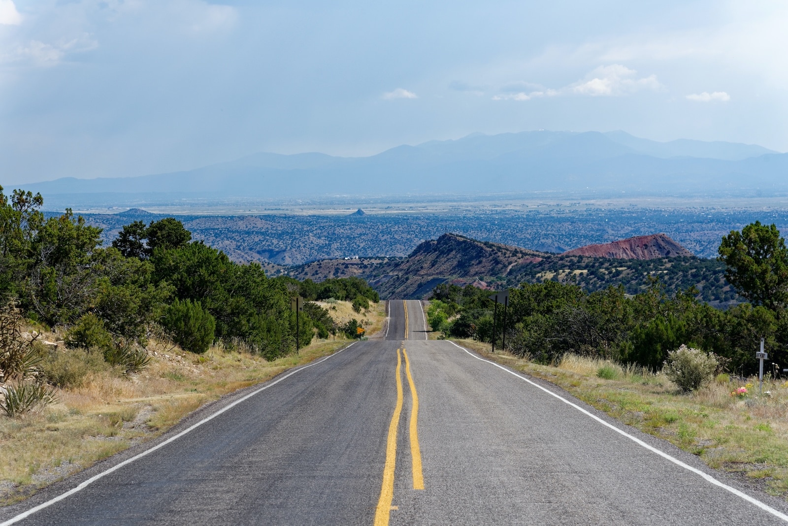 The Turquoise Trail scenic byway, a road leading to blue mountains and the Cerrillos Hills State Park.