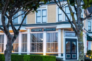 Exterior of yellow Victorian style building. Carter House Inns and Restaurant 301 in Old Town Eureka 
