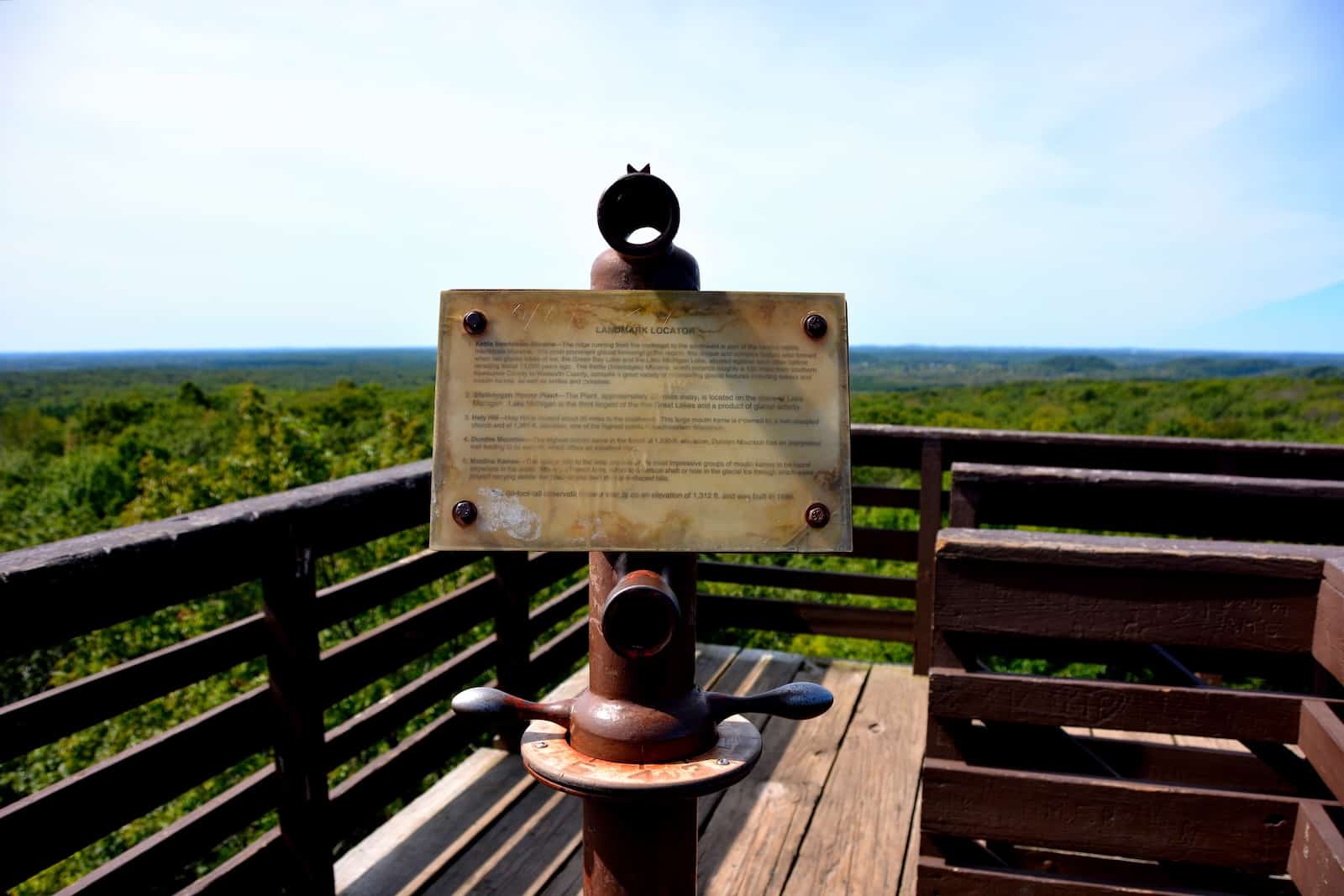 The location device on the top level of the Parnell Tower above the Kettle Moraine on a late summer day.