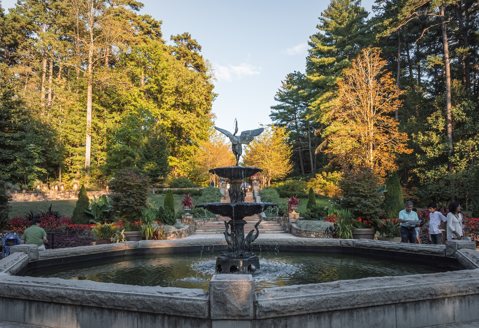 A fountain surrounded by fall leaves at the Sarah P. Duke Gardens, where you can see fall foliage in North Carolina.