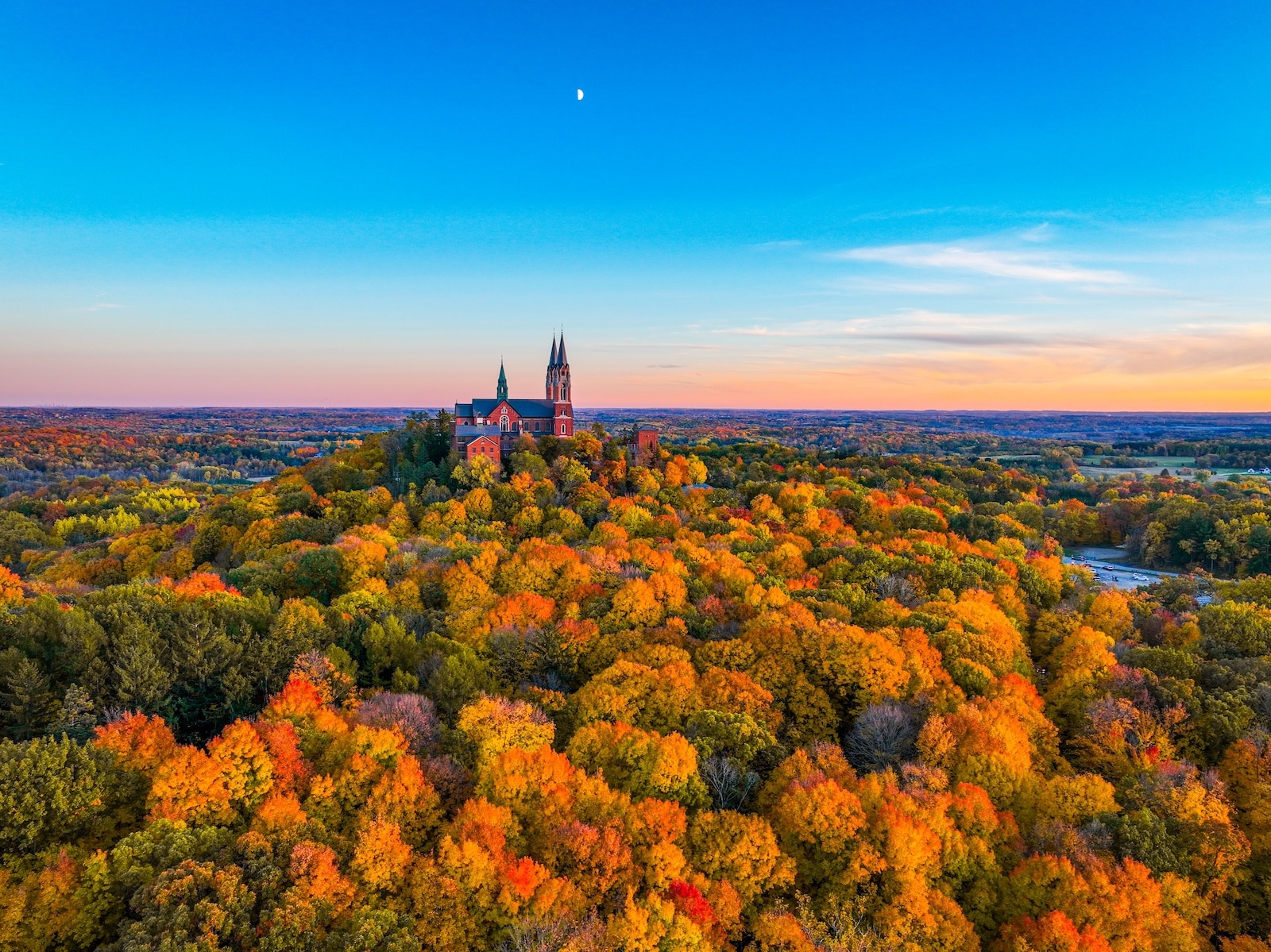 Wisconsin fall colors surrounding a basilica in West Bend, following the Wisconsin fall colors map.