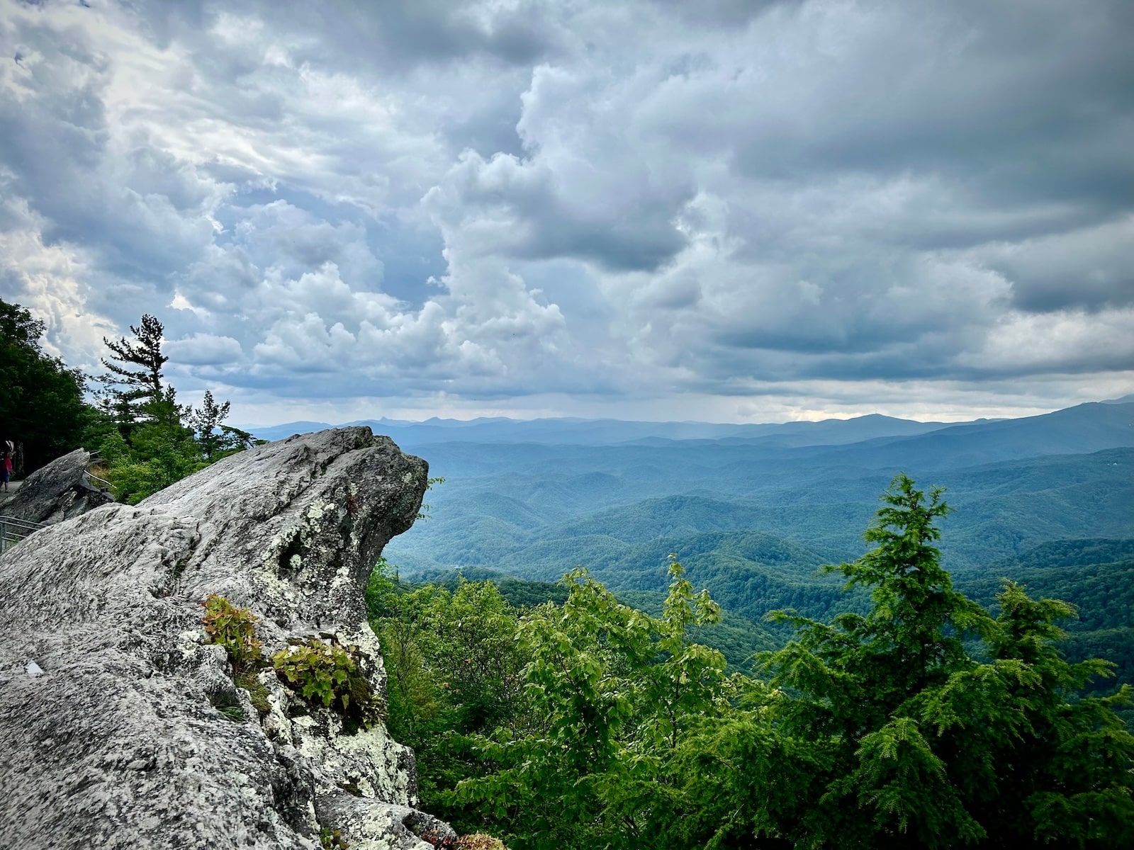 A popular spot with a rock and Blue Ridge Mountain views in Blowing Rock, one of many beautiful North Carolina mountain towns.