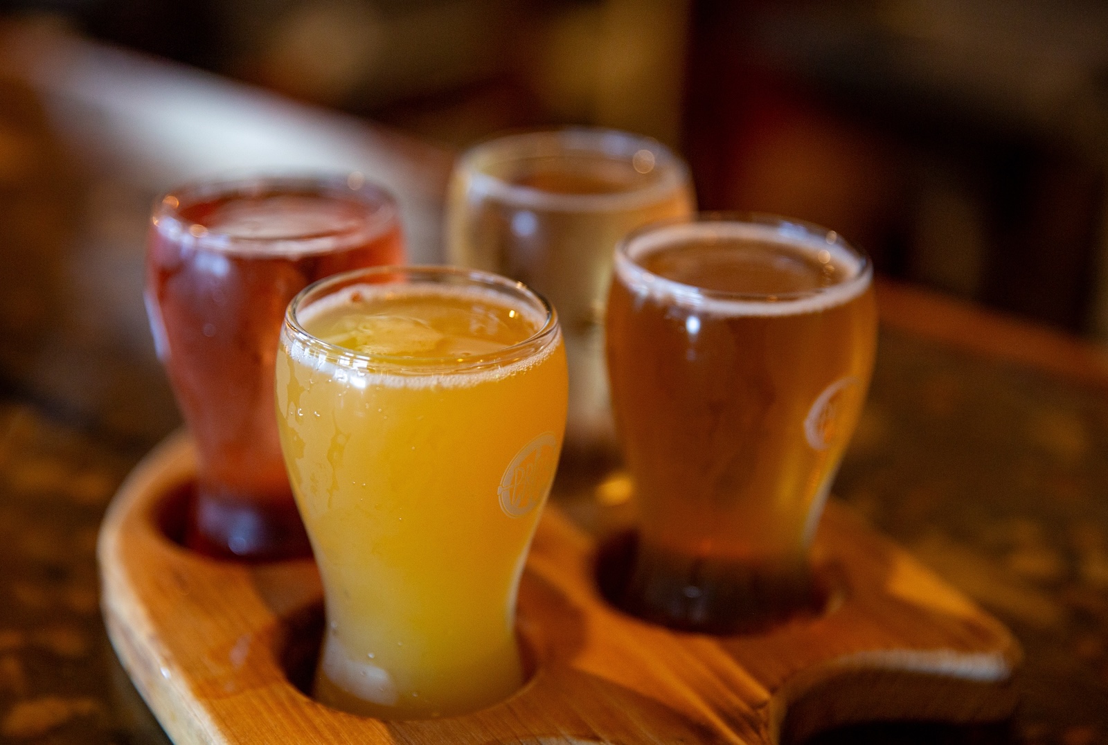 Sample of hard ciders during fall, what you can get on a getaway to see the fall foliage in North Carolina in Durham.